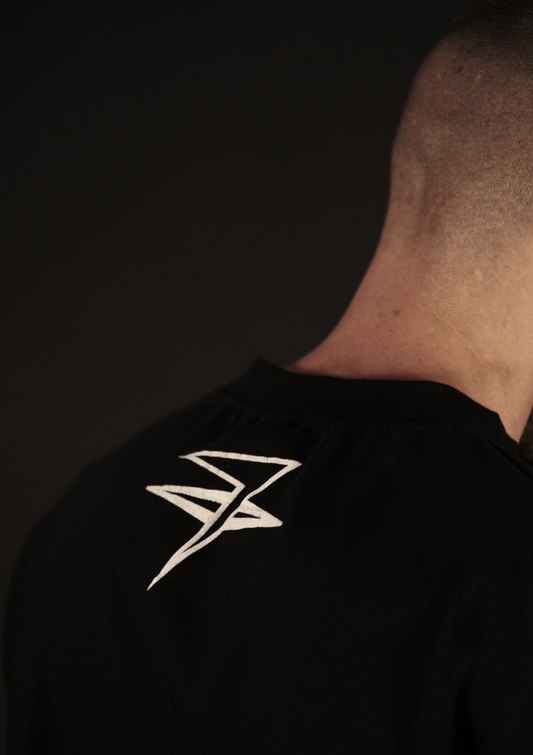 Детайлен артистичен принт на числото 7 върху черна streetwear тениска Holy Blood Murda Boyz Seven By Marsel